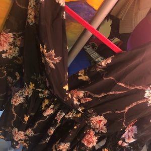 Black floral romper from The snookie shop